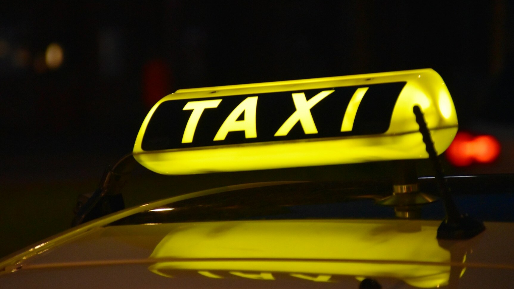 yellow Taxi light sign